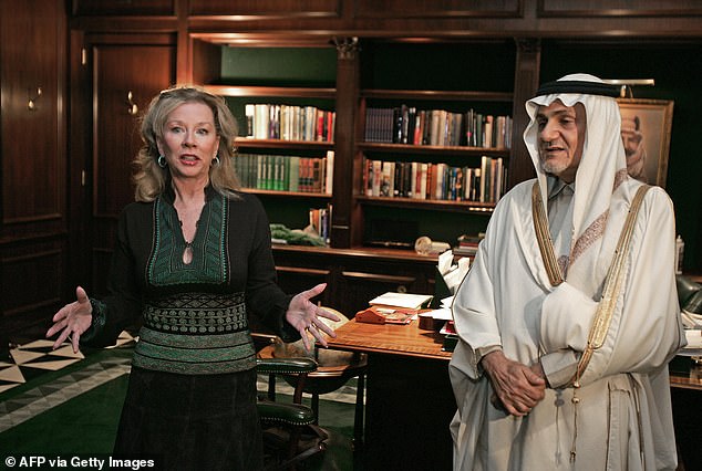 Film Director Jo Franklin, pictured in 2005, talks with Prince Turki Al-Faisal, Saudi Ambassador to the United States  inside the Saudi Embassy in Washington, DC