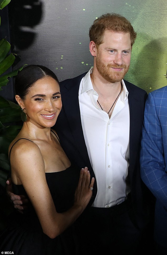 The strappy design showed off her toned shoulders and cinched at the waist, as the mother-of-two grinned for the cameras during Paramount's glitzy screening of the biopic at the Carib Theatre