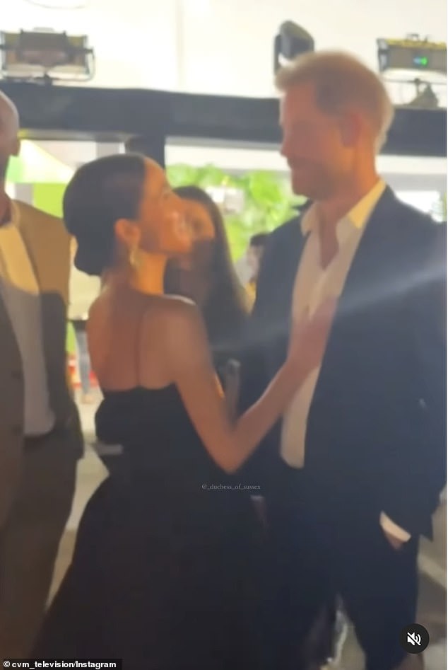 The expert claimed Meghan, 42, who was dressed in a full-skirted flowing black gown with a slick-back bun, appeared to signal 'proud ownership' with her affectionate gestures, signalling 'he’s mine'