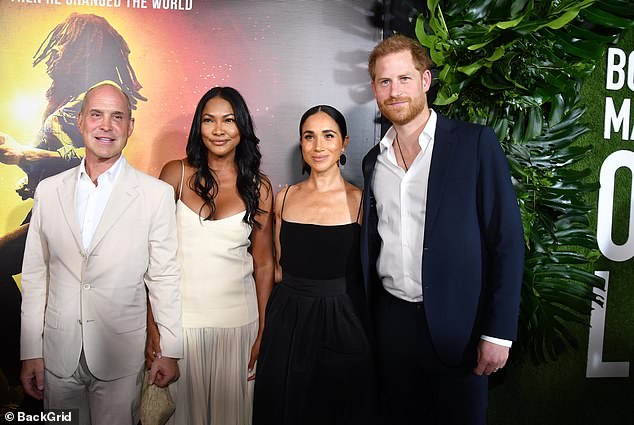 The pair posed with the president and CEO of Paramount Pictures and Nickelodeon, Brian Robbins, (left) and his wife Tracy James (second left)