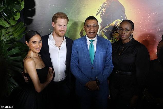 Prince Harry and Meghan with Jamaica's Prime Minister Andrew Holness and his wife Juliet