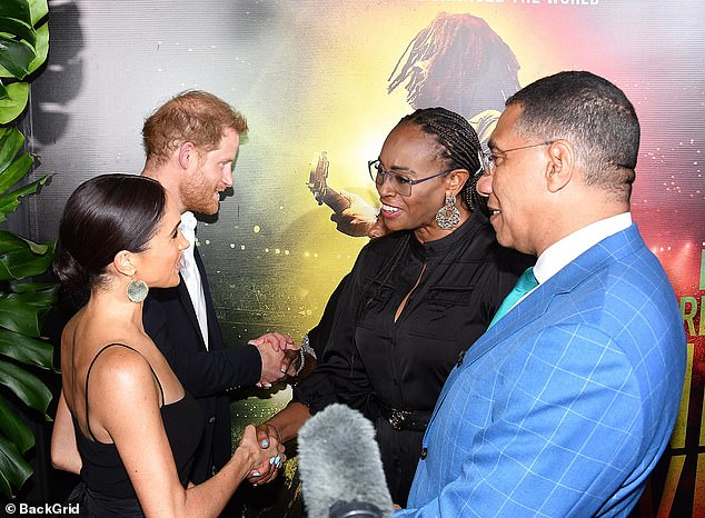 Prince Harry and Meghan with Jamaica's Prime Minister Andrew Holness and his wife Juliet