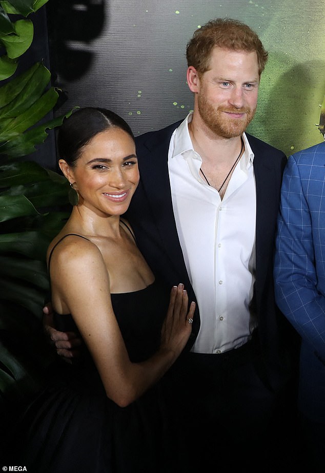 The Duke and Duchess of Sussex arrive at the Carib Theatre in Kingston, Jamaica, last night