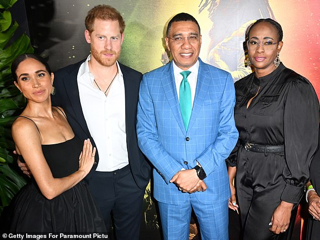 Prince Harry and Meghan Markle with Jamaica's Prime Minister Andrew Holness and his wife Juliet last night for the premiere of Bob Marley: One Love at the Carib Theatre in Kingston