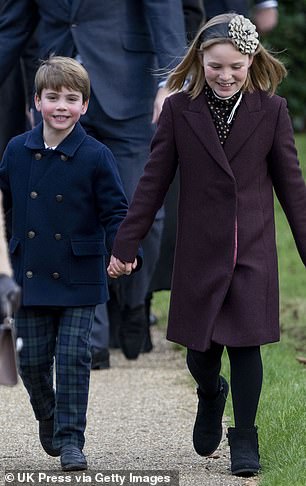 Cousins at Christmas! The pair walked hand in hand together