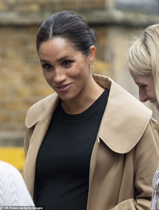 Meghan wears earrings made by artificial diamond maker Kimai on January 10, 2019 in London