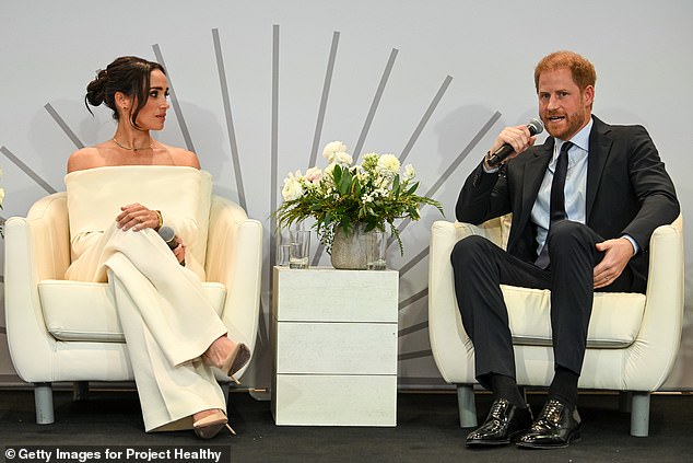 Meghan and Harry speak onstage in New York for World Mental Health Day. They are addressing The Archewell Foundation Parents' Summit: Mental Wellness in the Digital Age