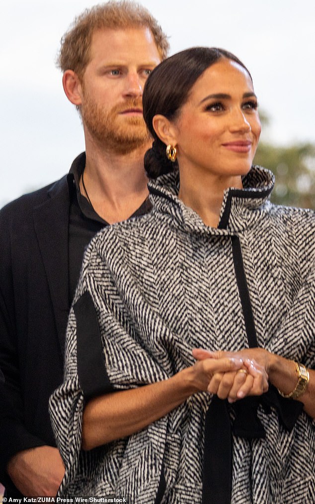 Mr Bower said 'the monarchy in fact depends on actually obliterating the Sussexes from our state of life because their continuation is bad for us' (Pictured: Meghan Markle and Harry at the One805 Live concert in Santa Barbara in 2023)