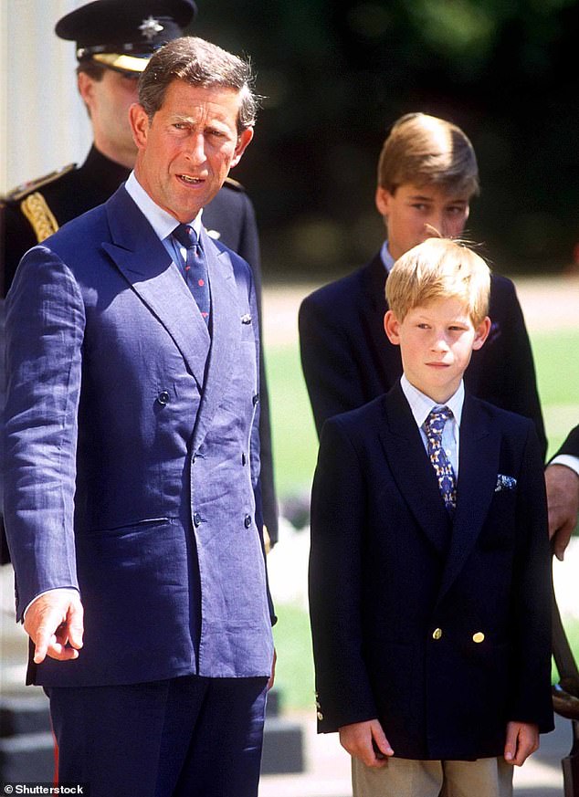 King Charles is seen with his youngest son Prince Harry in 1995 when the Duke of Sussex was a child