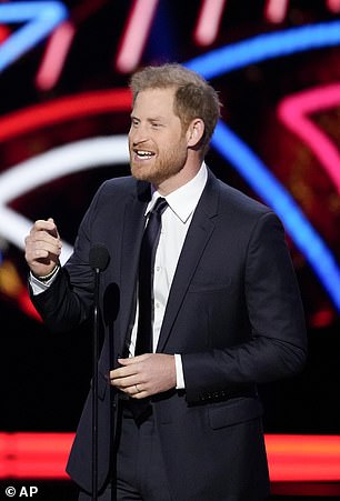 Harry was full of beans during his speech - but made no mention of his father's cancer battle