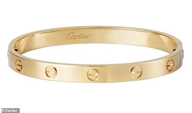 Meghan also wore a Cartier Love bracelet, which is thought to have been a gift from Harry