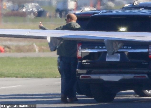 Harry is pictured on the ground at Vancouver yesterday ahead of the Invictus Games events