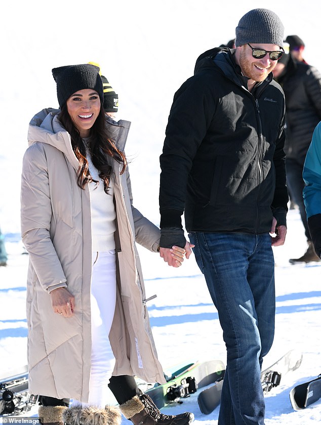 Harry and Meghan holding hands and smiling on Valentine's Day in Canada - the country they fell in love