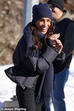 Meghan waves while attending the Invictus Games event in Whistler yesterday