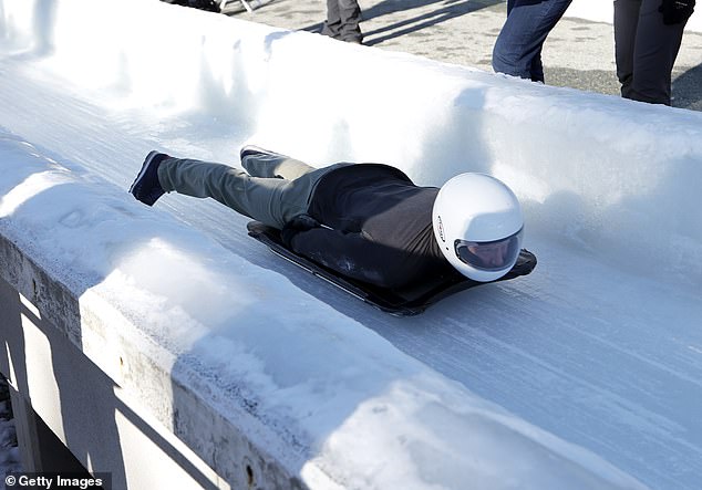 Prince Harry proved himself on Thursday as he attempted a run around a skeleton bobsled track - achieving an impressive top speed of 61mph