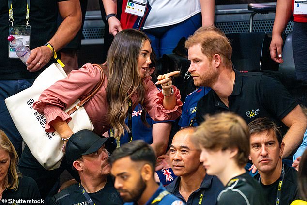 The pair chatted in the stands as they watched a wheelchair basketball match between Team UK and Ukraine in Dusseldorf