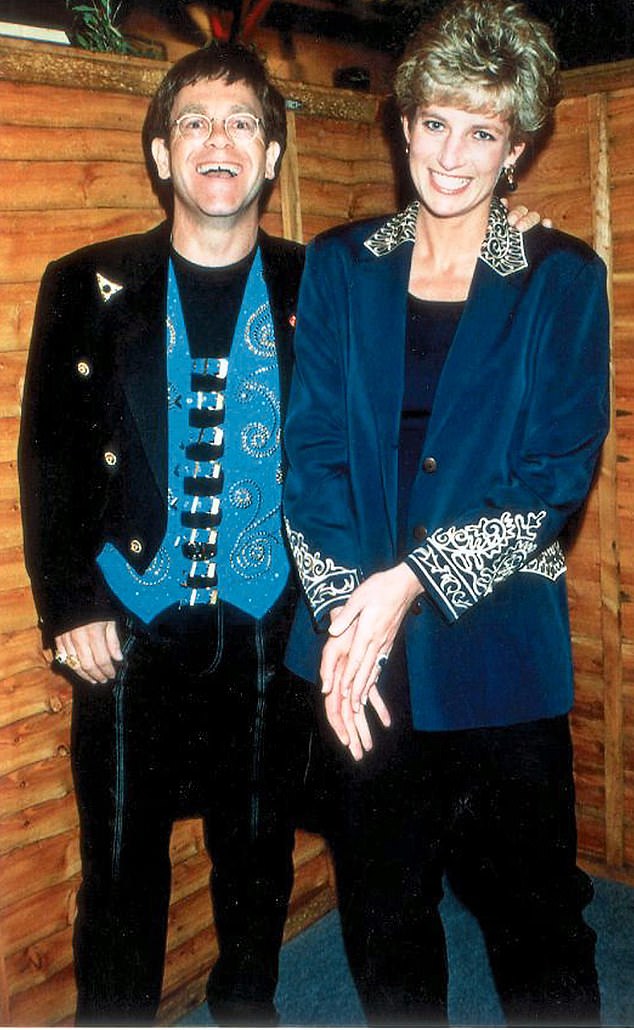 Diana, Princess of Wales with singer Elton John at a television awards ceremony in 1993