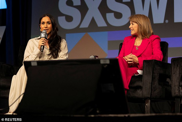 Meghan spoke about issues with social media on the panel next to Katie Couric