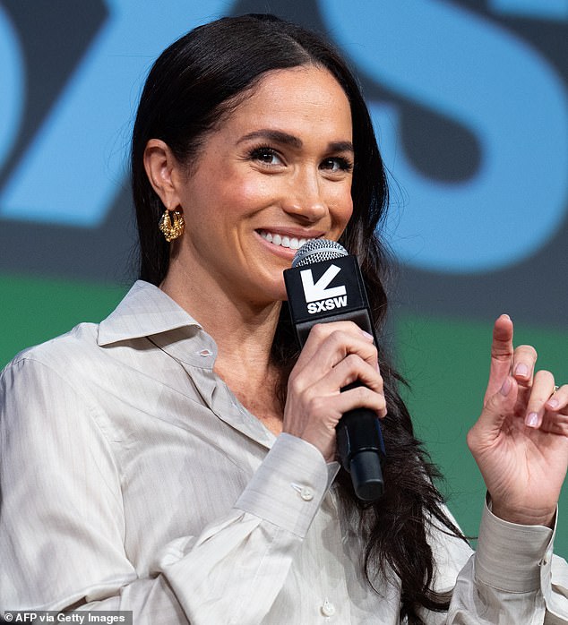 The former senior royal (pictured) opted for a simple hair and make-up look, opting for a matte base with bronzer and pink blush, and a natural lip. She wore her long black tresses loose