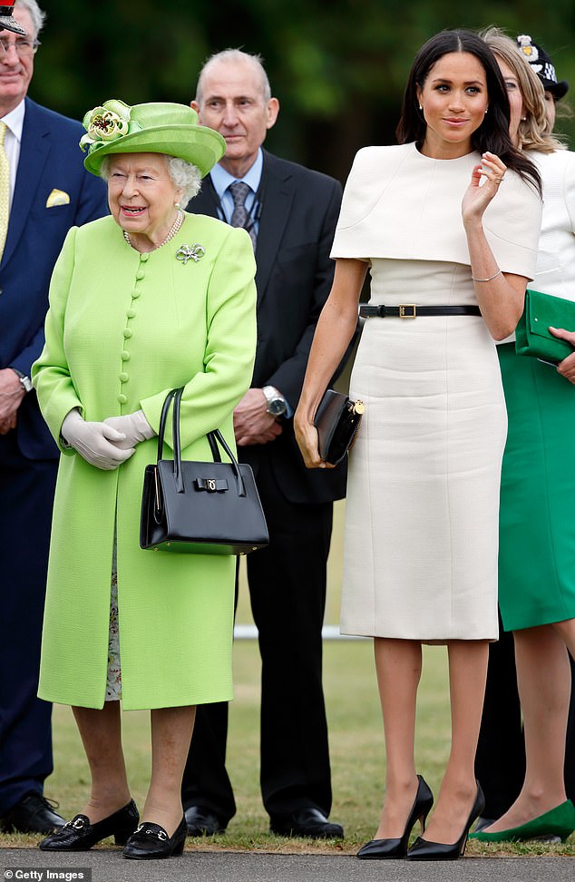 Queen Elizabeth II and Meghan, Duchess of Sussex open the new Mersey Gateway Bridge on June 14, 2018 in Widnes, Cheshire