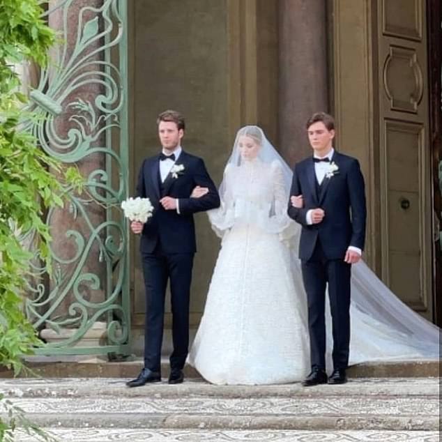 Louis walked his eldest sister Kitty down the aisle with their half-brother Samuel Aitken during her Italian wedding - instead of their father