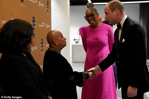 Prince William, Prince of Wales meets Baroness Doreen Lawrence as he attends tonight