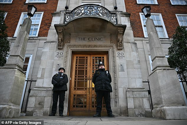 The diagnosis took place after the future Queen underwent abdominal surgery at The London Clinic in January. Pictured: Police officers stand guard outside the building on January 28