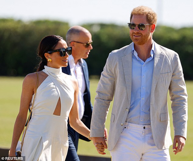 The royal, who has worn the designer before, paired the flowing white sundress with a £2,650 Maison Valentino bag