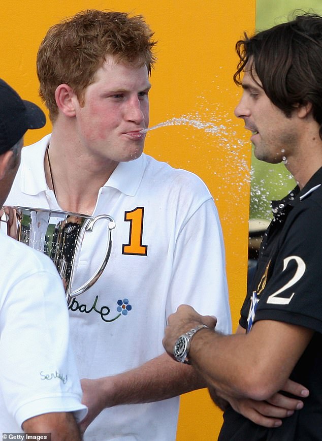 Prince Harry seen playfully spitting champagne in Nacho's direction at the Sentebale charity polo match before the Duke met Meghan