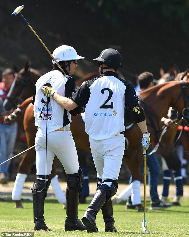 Score! Nacho congratulates Prince Harry after scoring during the Sentebale Handa Polo Cup charity match in Rome; pictured May 2019