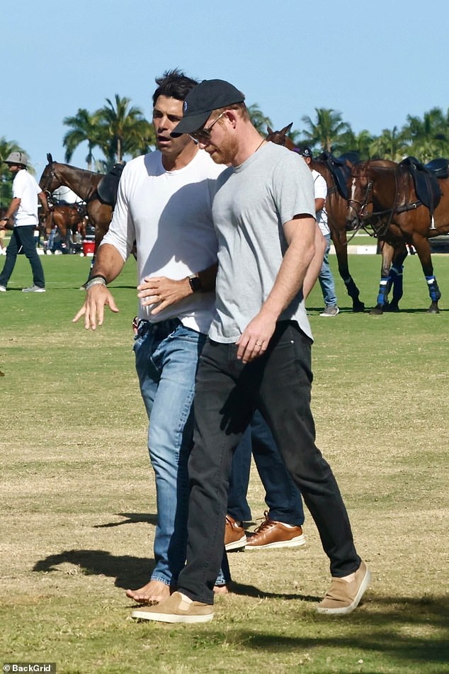 Pictured: Prince Harry seen walking with his polo teammate Nacho Figueras during the shoot yesterday