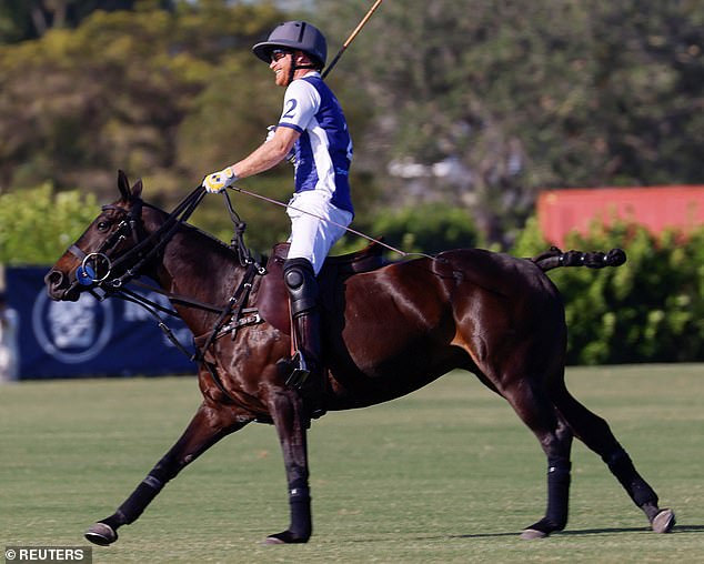 Harry looked thrilled to be back in the saddle and was seen grinning from ear-to-ear as he warmed up for the match