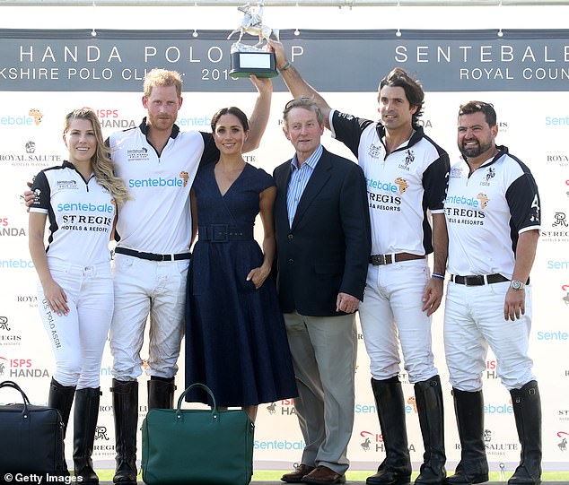 Ashley, Harry, Meghan, Enda Kenny, Nacho and Miguel Mendoza pose with the Sentebale Polo 2018 trophy after the Sentebale Polo held at the Royal County of Berkshire Polo Club