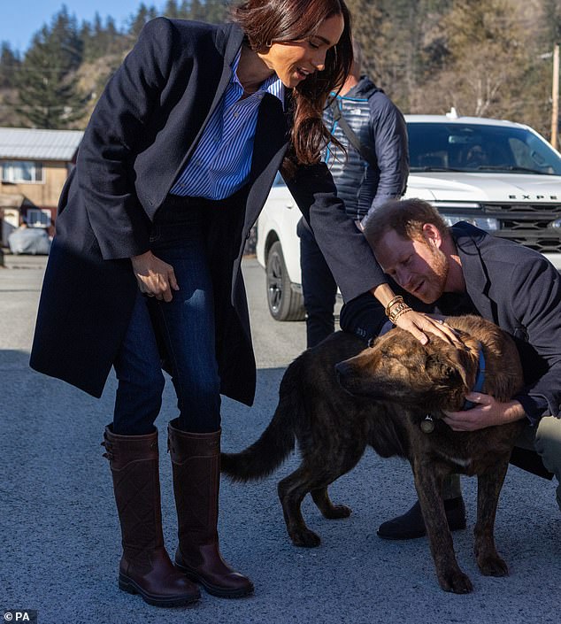 Meghan is pictured with a large stack of jewellery, including the $5,500 bracelet at the Mount Currie Community Centre just one day after Valentine's Day