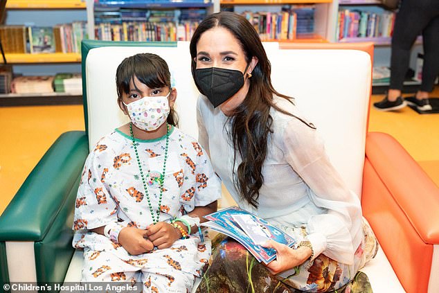 The Duchess beamed alongside the children after she read a slew of stories at the Children's Hospital in LA