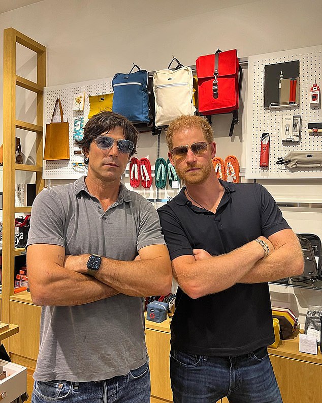 The boys posing in women's sunglasses on a shopping trip for treats to take home to Meghan from their trip to Japan