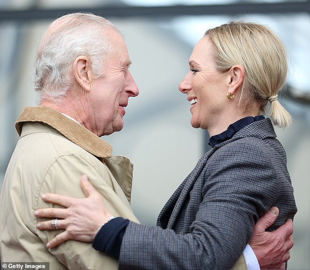 Charles and Zara Tindall hug as as they greet each other at the Endurance event on day three of the Royal Windsor Horse Show today