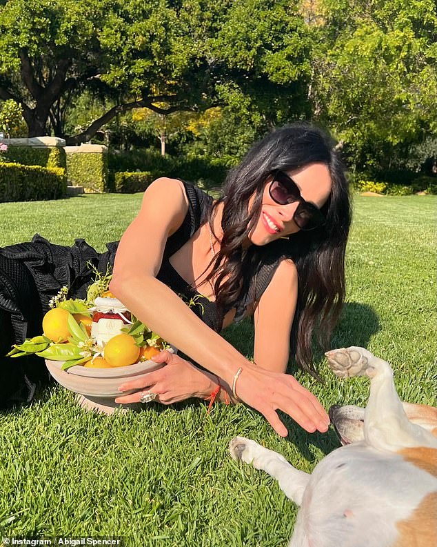 Abigail, 42, was gifted the sixth jar in the batch, she revealed yesterday in a photoshoot that showcased her reclining in the grass with the precious preserve