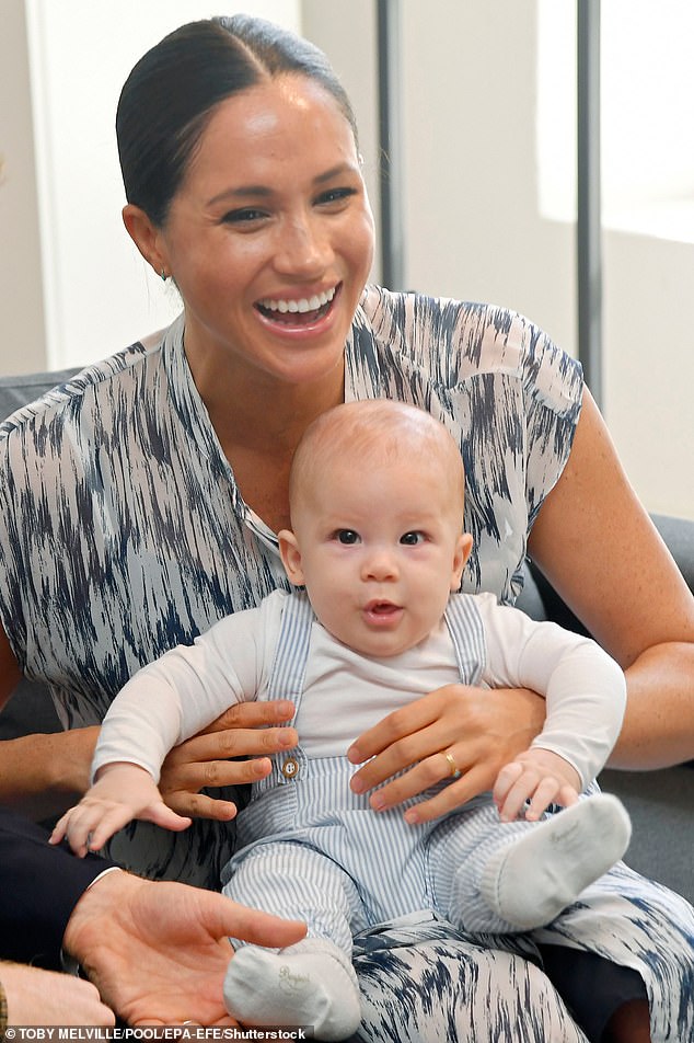 Archie with his mother during her royal tour of South Africa with her husband Prince Harry