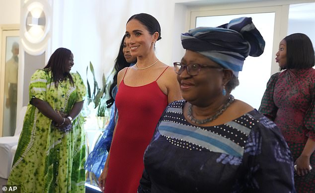 The Duchess of Sussex walks alongside Dr Ngozi Okonjo-Iweala, right, Director-General of the World Trade Organization