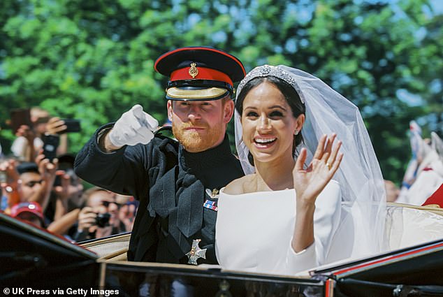 The crowds plus the sunshine made the happy couple  glow as they greeted the crowds