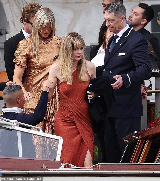 Cressida looked focused as she boarded to the water taxi to get to the celebrity filled wedding ceremony