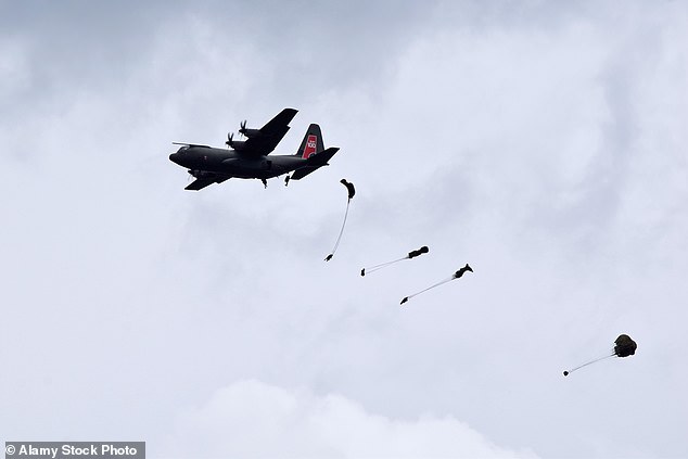 The British paratroopers will drop from the sky over Normandy on June 5 in tribute to the 18,000 men from Allied forces who landed there shortly after midnight on June 6, 1944. Dome parachute drop from C-130 Hercules transport aircraft as part of the D day 100 commemorations, Sonnerville, France