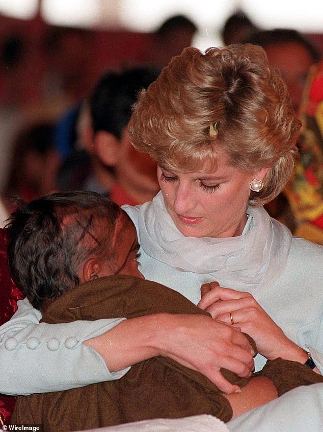 'Favourite': Of the thousands of photographs Anwar Hussein took of Princess Diana, this one of her cradling a young cancer patient in Lahore, Pakistan in 1996 was her most cherished