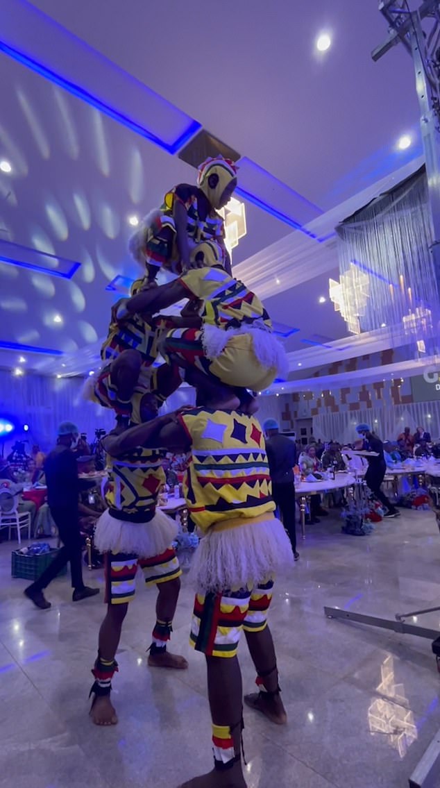 Members of the dance troupe were seen climbing on each others shoulders as they attempted to create a human pyramid