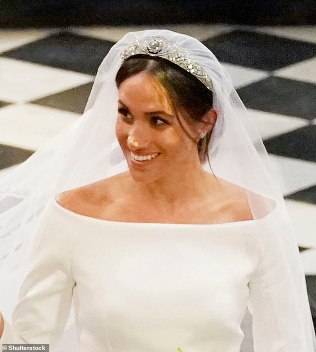 Daniel cemented himself in the history books when he did Meghan's make-up for her wedding to Prince Harry in 2018 - and worked alongside her at various events in her two years as a working royal. Meghan is pictured on her wedding day in 2018 - when he make-up was done by Daniel