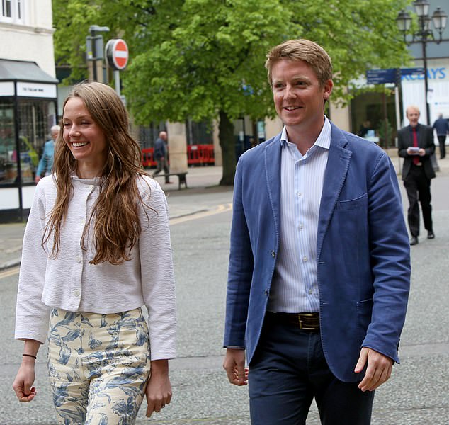 The Duke of Westminster and his fiancée Olivia Henson were introduced to each other by mutual friends. Pictured: Hugh and Olivia visiting three charities supported by the Westminster Foundation in Chester last month