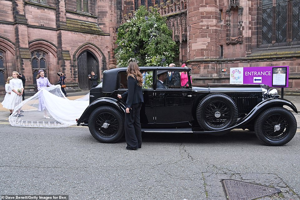 Olivia and her husband the Duke of Westminster leave their wedding ceremony at Chester Cathedral