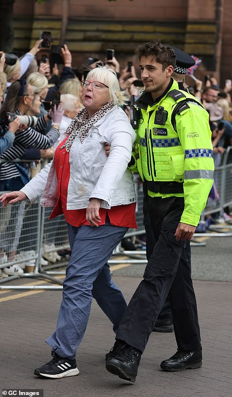 A second silver-haired protester was also arrested following the killjoy stunt