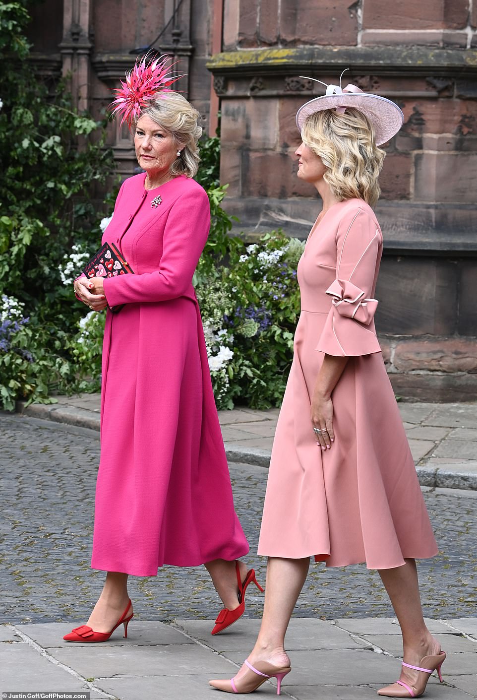 The grooms mother, Natalia Grosvenor, Duchess of Westminster (left), arriving at the ceremony